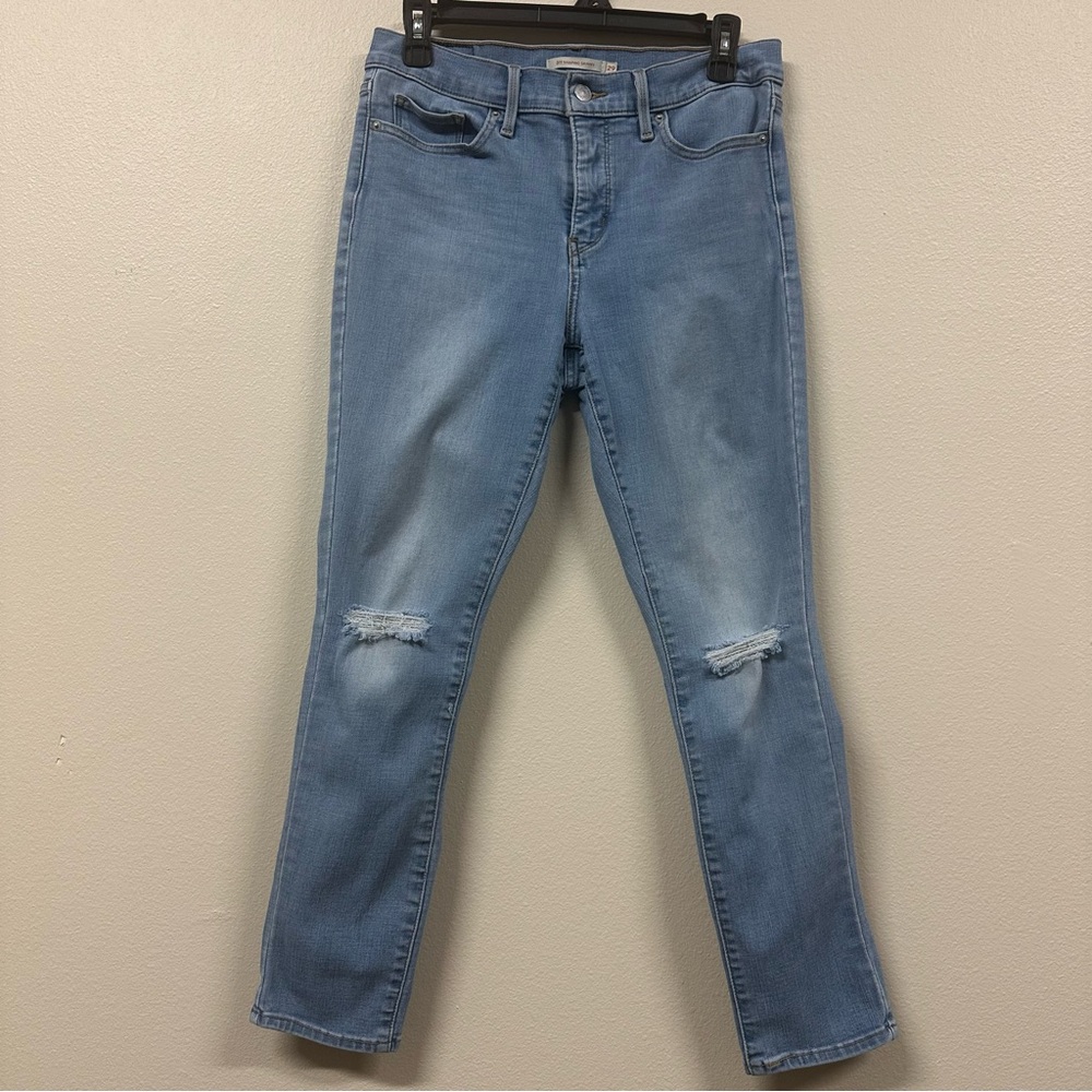 Levi’s 311 Shaping Skinny Blue Knee Distressed Jeans
